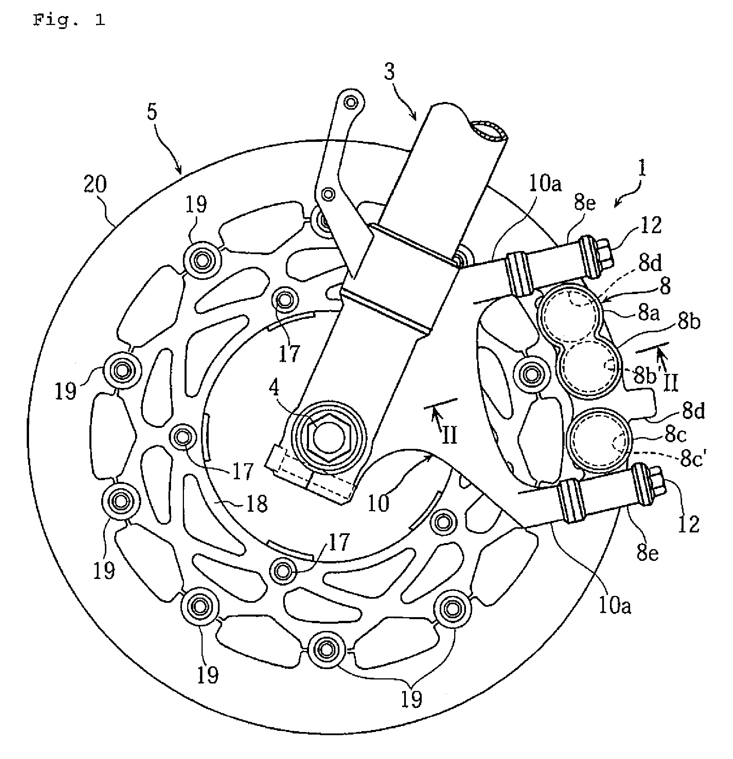 Disk braking device and motorcycle provided with the disk braking device