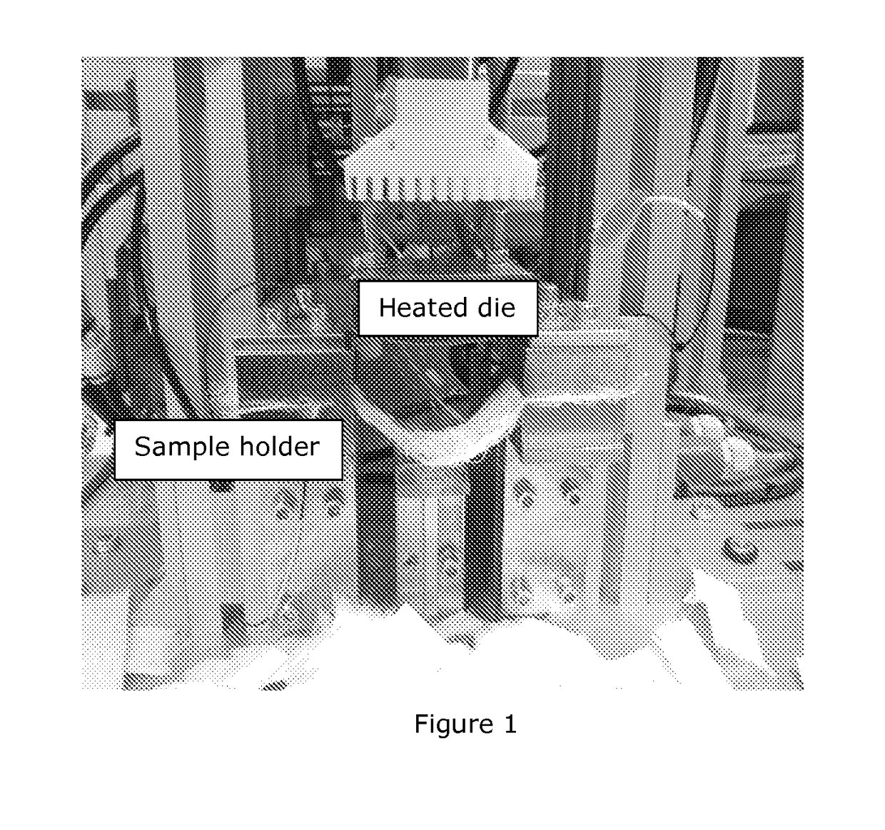 Thermoplastic fibrous materials and a method of producing the same