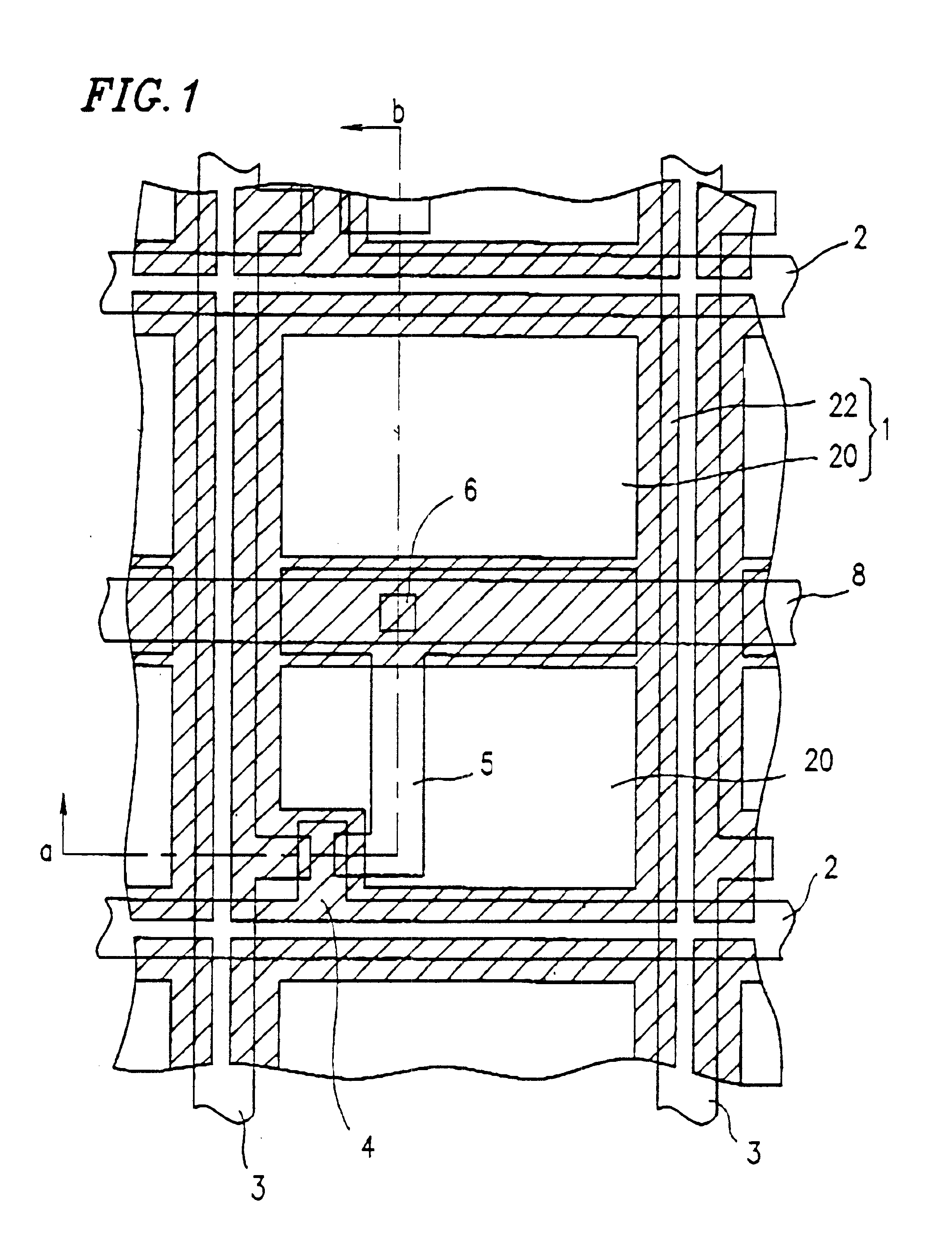Liquid crystal display in which at least one pixel includes both a transmissive region and a reflective region
