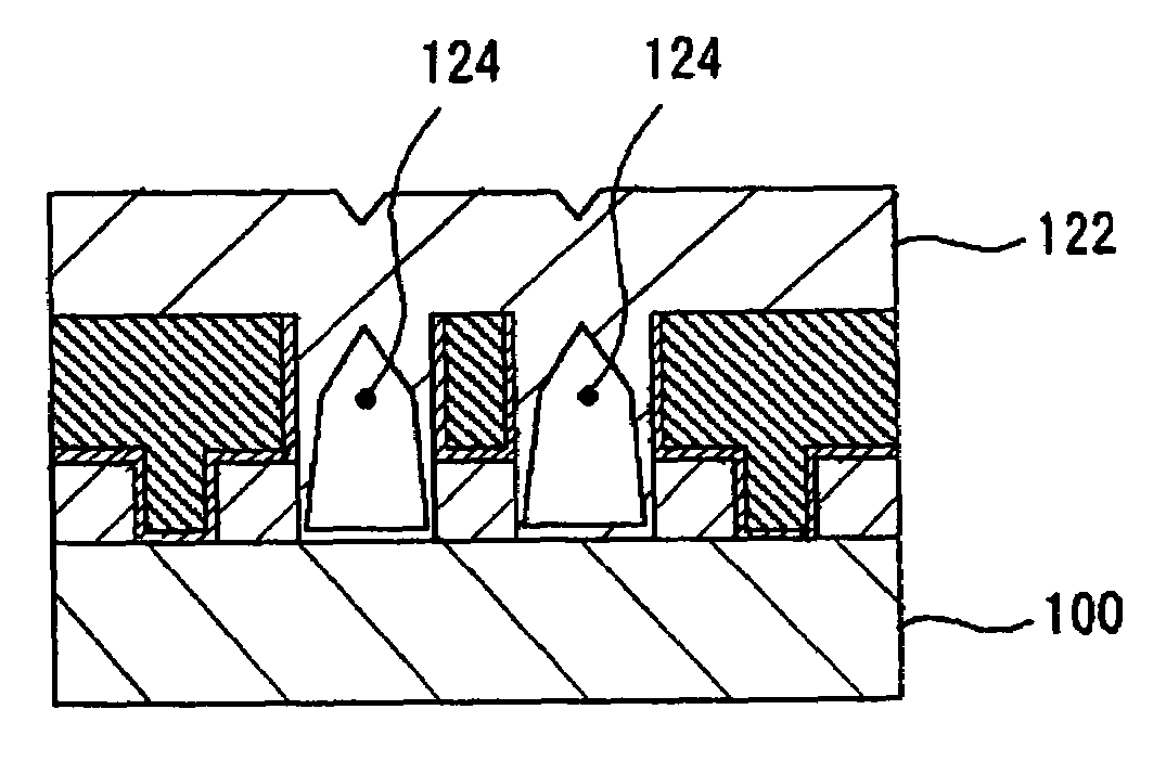 Manufacturing of a semiconductor device with a reduced capacitance between wirings