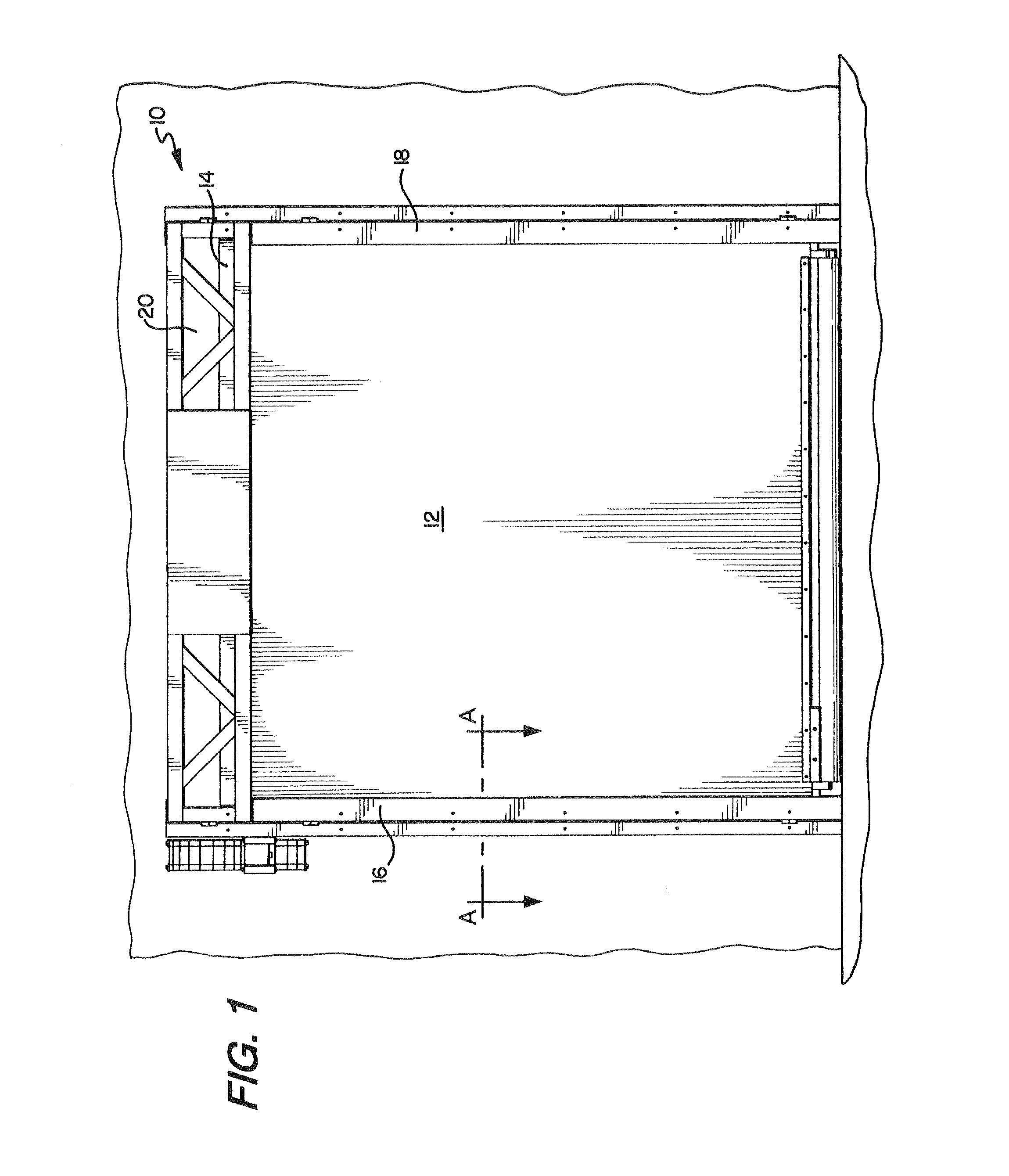Segmented wind lock configuration for overhead roll-up doors and method of constructing the same