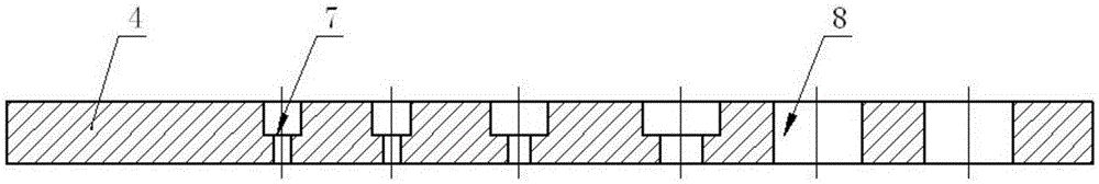 Tapping fixture with screw tap storage function