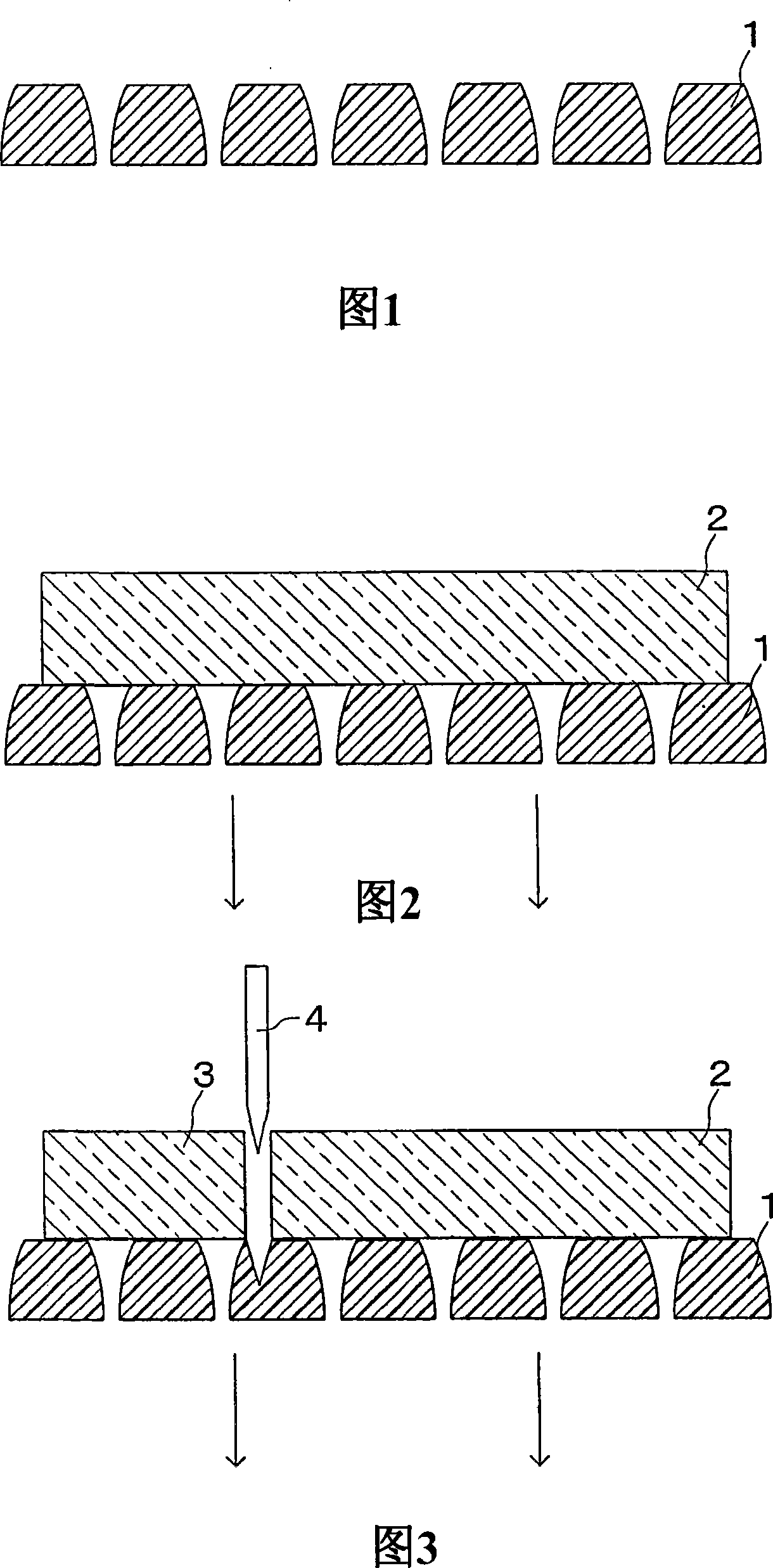 Method of manufacturing a polarizing plate, and a cutting mat used in the method