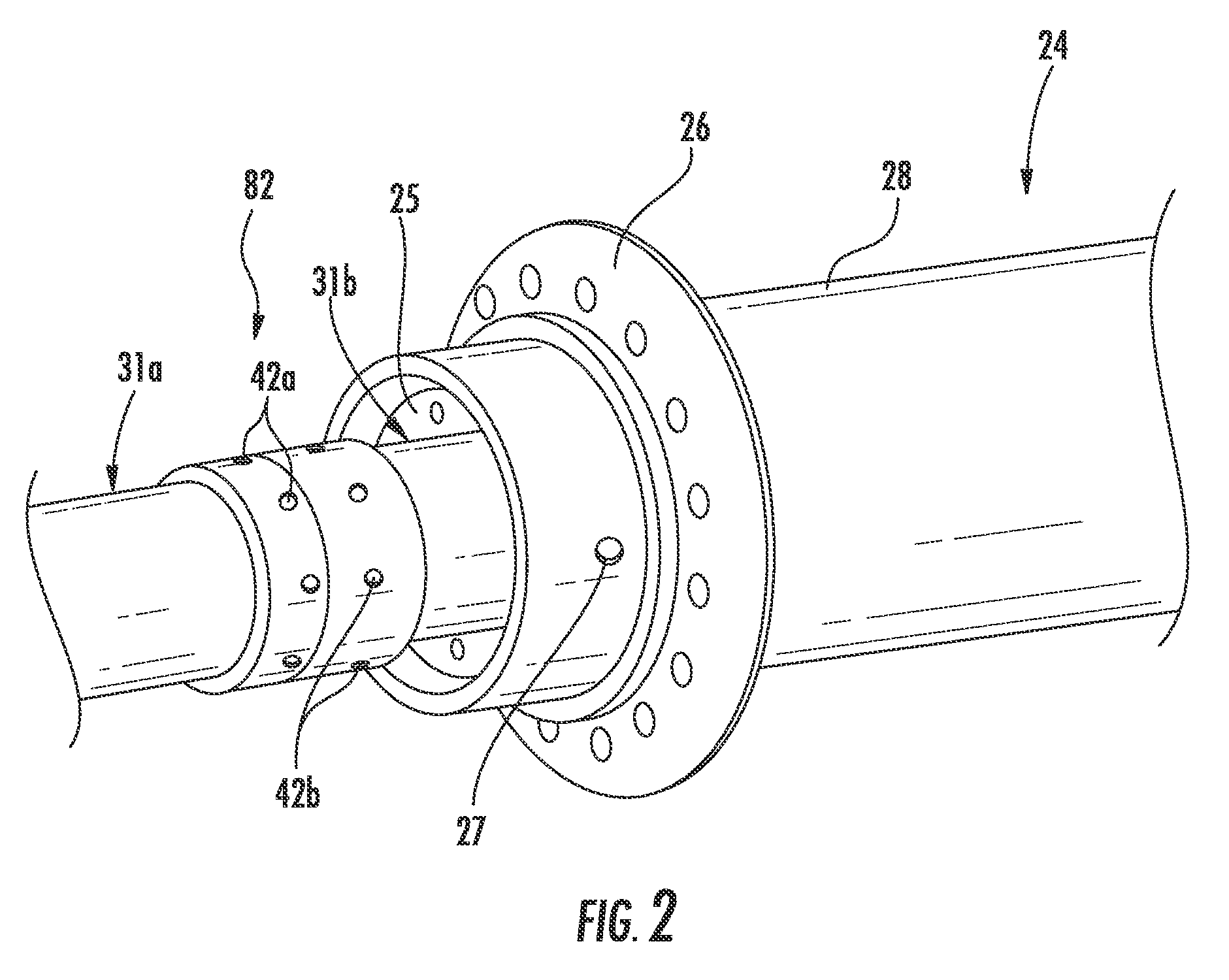 RF antenna assembly with dielectric isolator and related methods