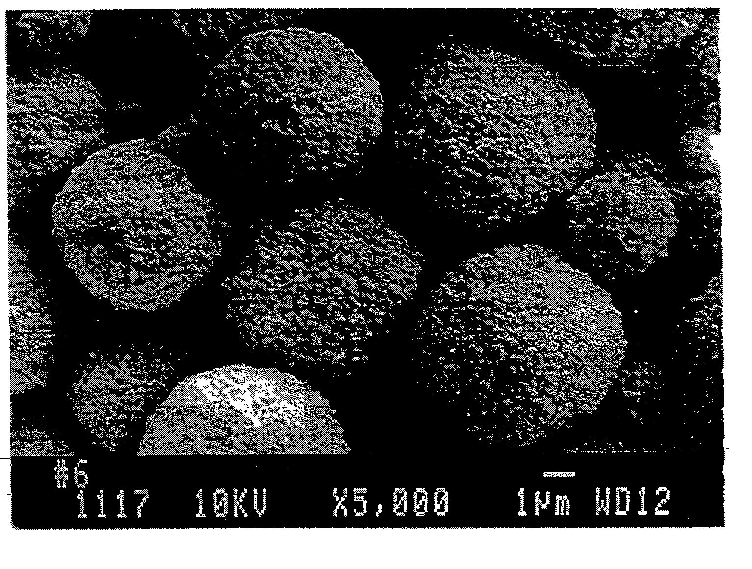 Micro-serrated, dyed color toner particles and method of making same