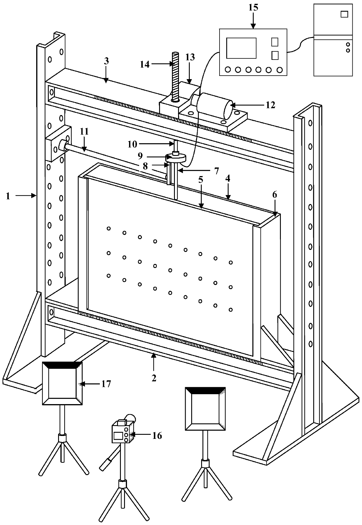 A test device and method for measuring the displacement field of soil around a loaded structure