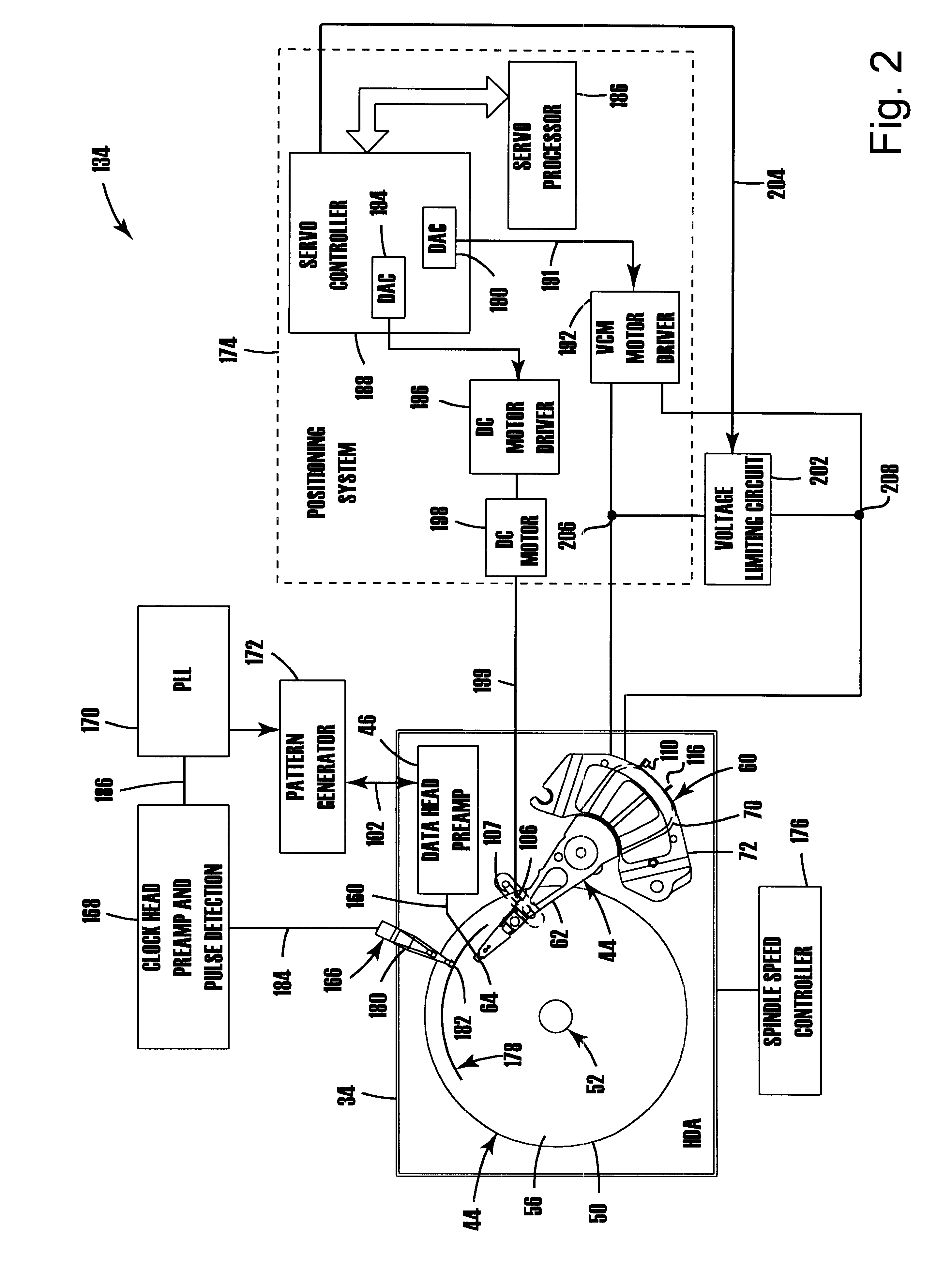 Disk drive employing method of unlatching actuator arm using VCM voltage limiting circuit to limit actuator arm velocity