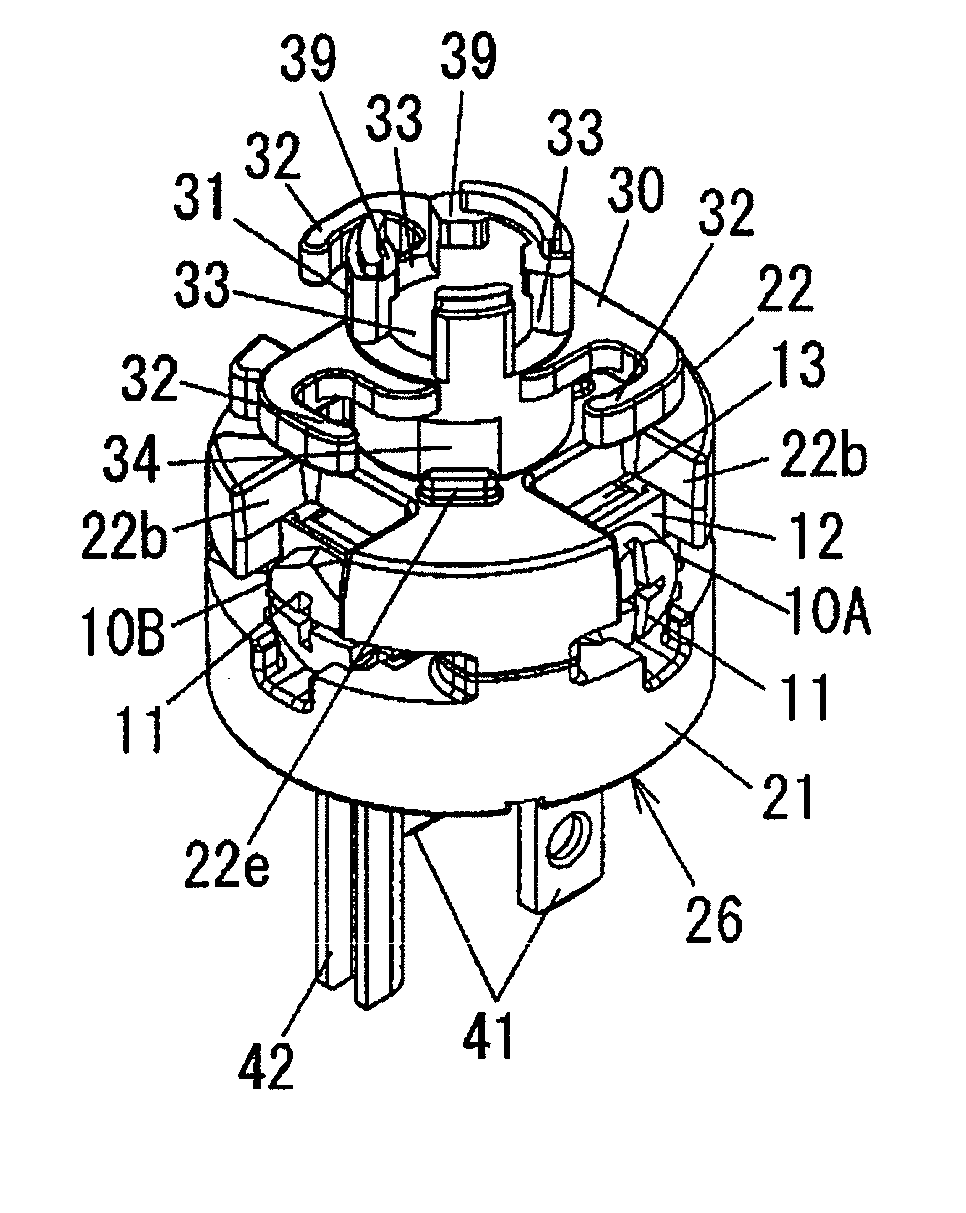 Electric wire positioning member and attachment plug including the same