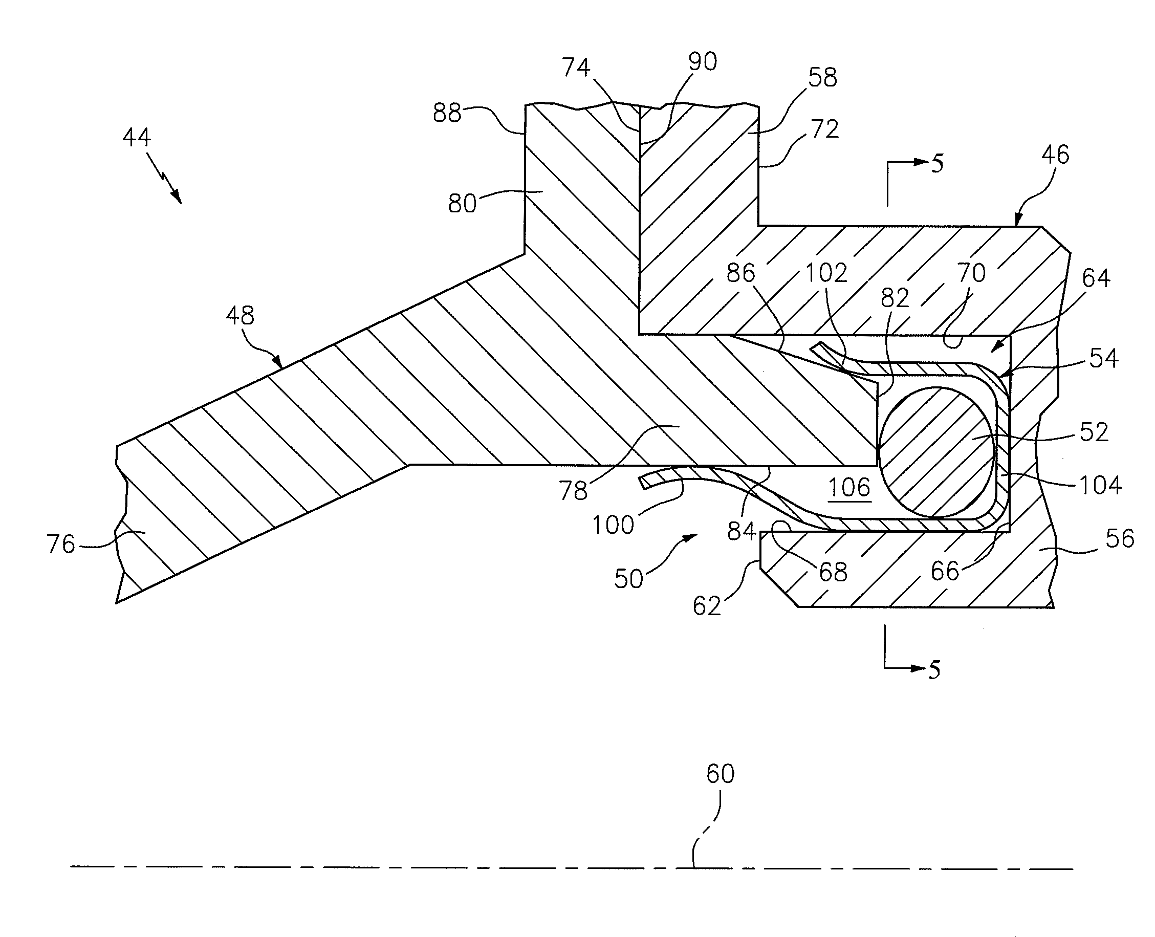 Assembly for sealing a gap between components of a turbine engine