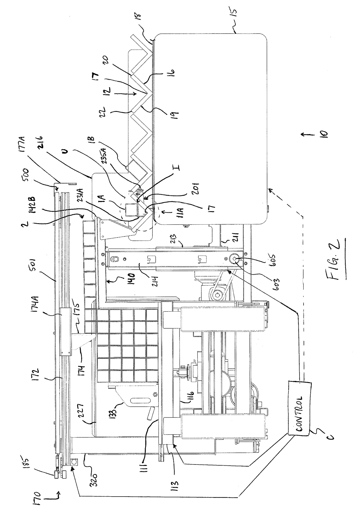 System for Loading Elongated Members Such as Tubes Onto a Conveyor for Later Processing