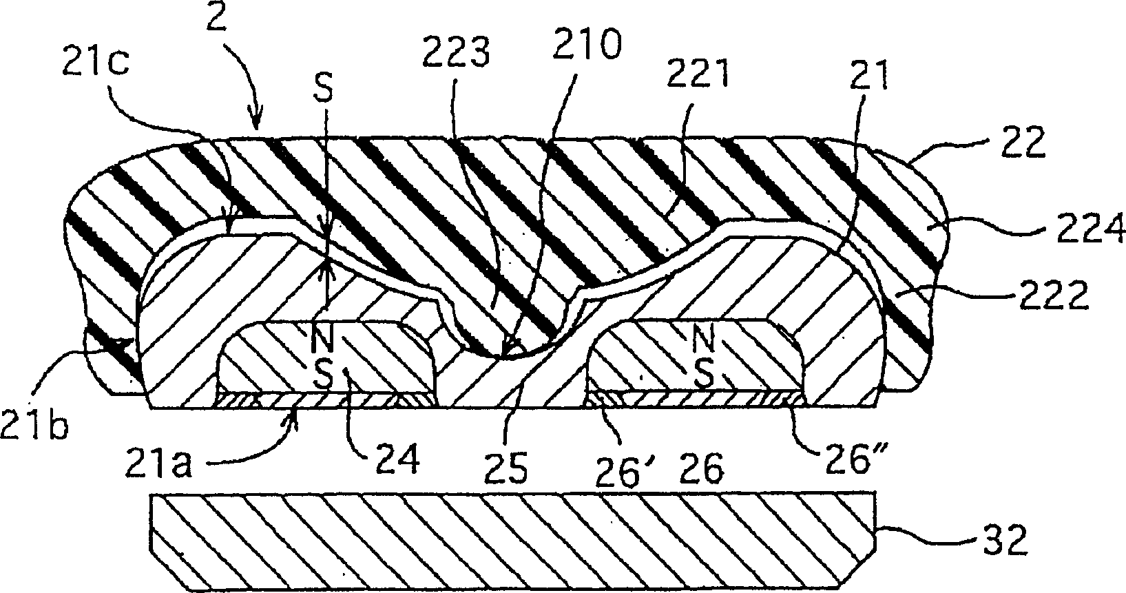 False tooth attachment and method and spacer for fixing same