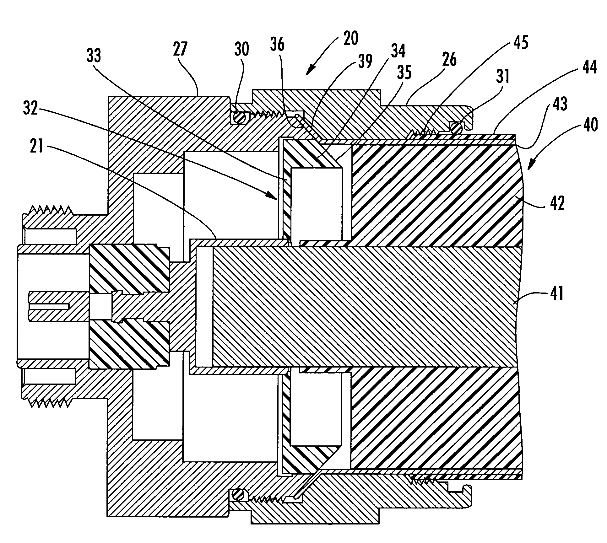 Coaxial connector including clamping ramps and associated method