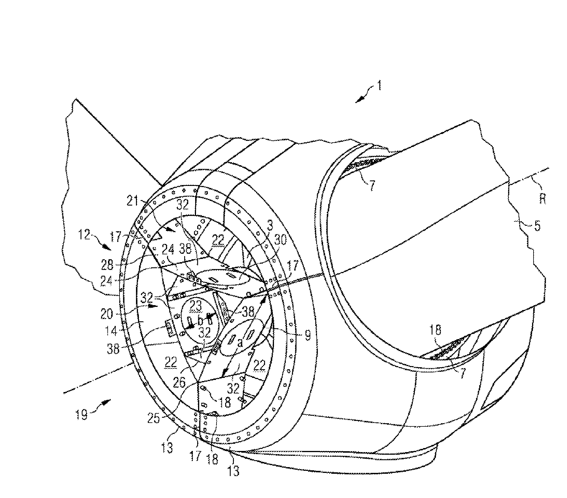 Safety device for an operator during the servicing of a hub of a wind turbine