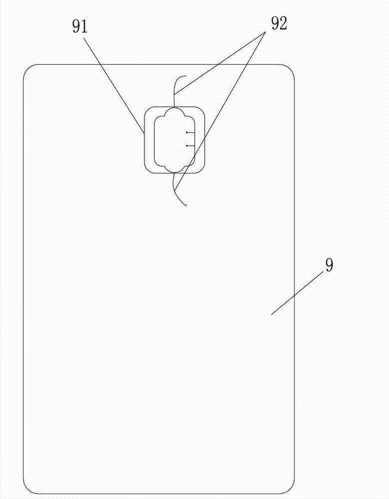 Double-interfaced card packaging method and take-up clamp thereof