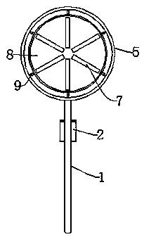 Device for removing oil stains on the surface of a hand-held stove