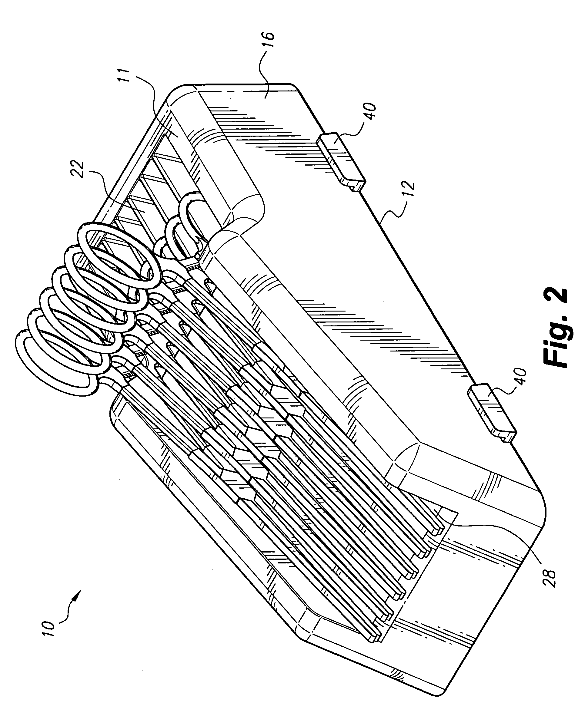 Grooved angled tray for ring-handled surgical instruments
