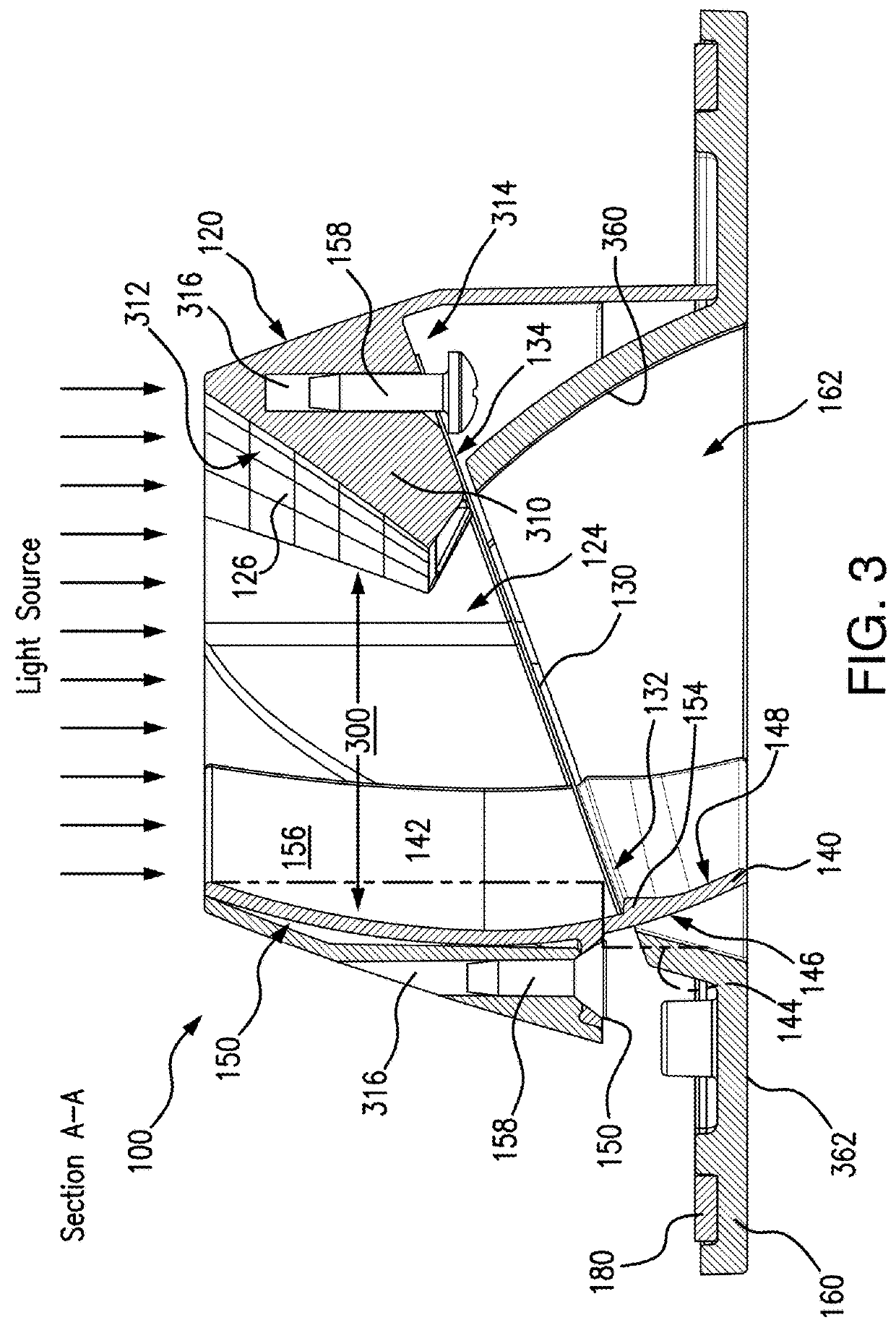 Optical and mechanical assembly for wall wash lighting