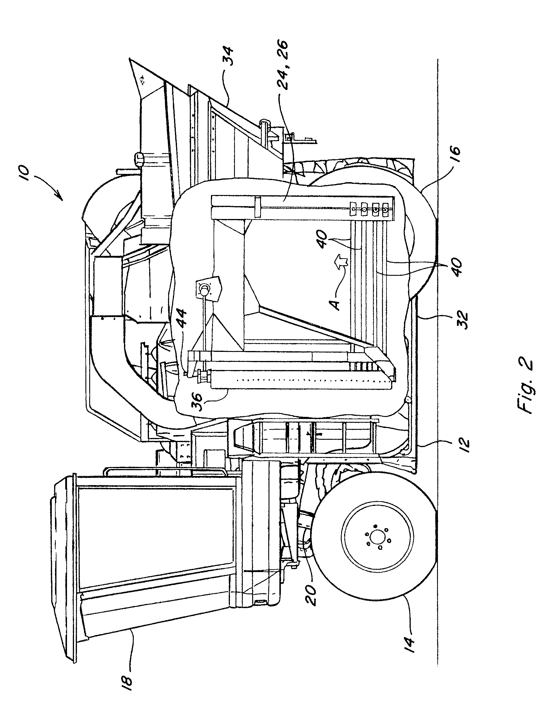 Fruit harvester with system and method for detecting and reducing forces exerted against rigid standing objects