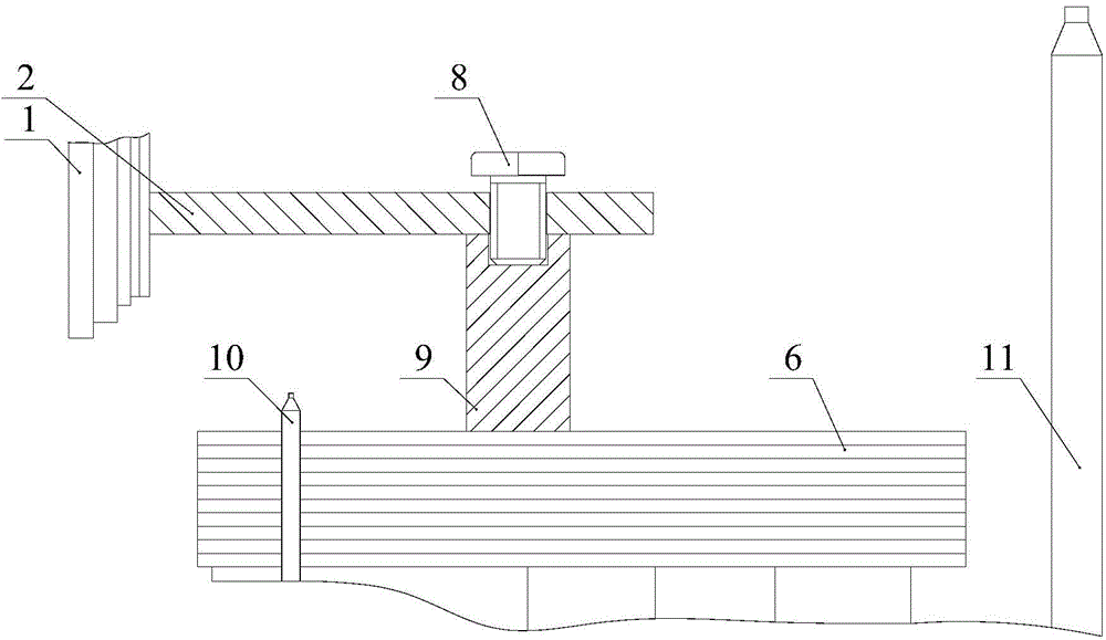 Transformer body holddown and method