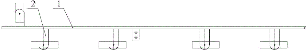 Transformer body holddown and method