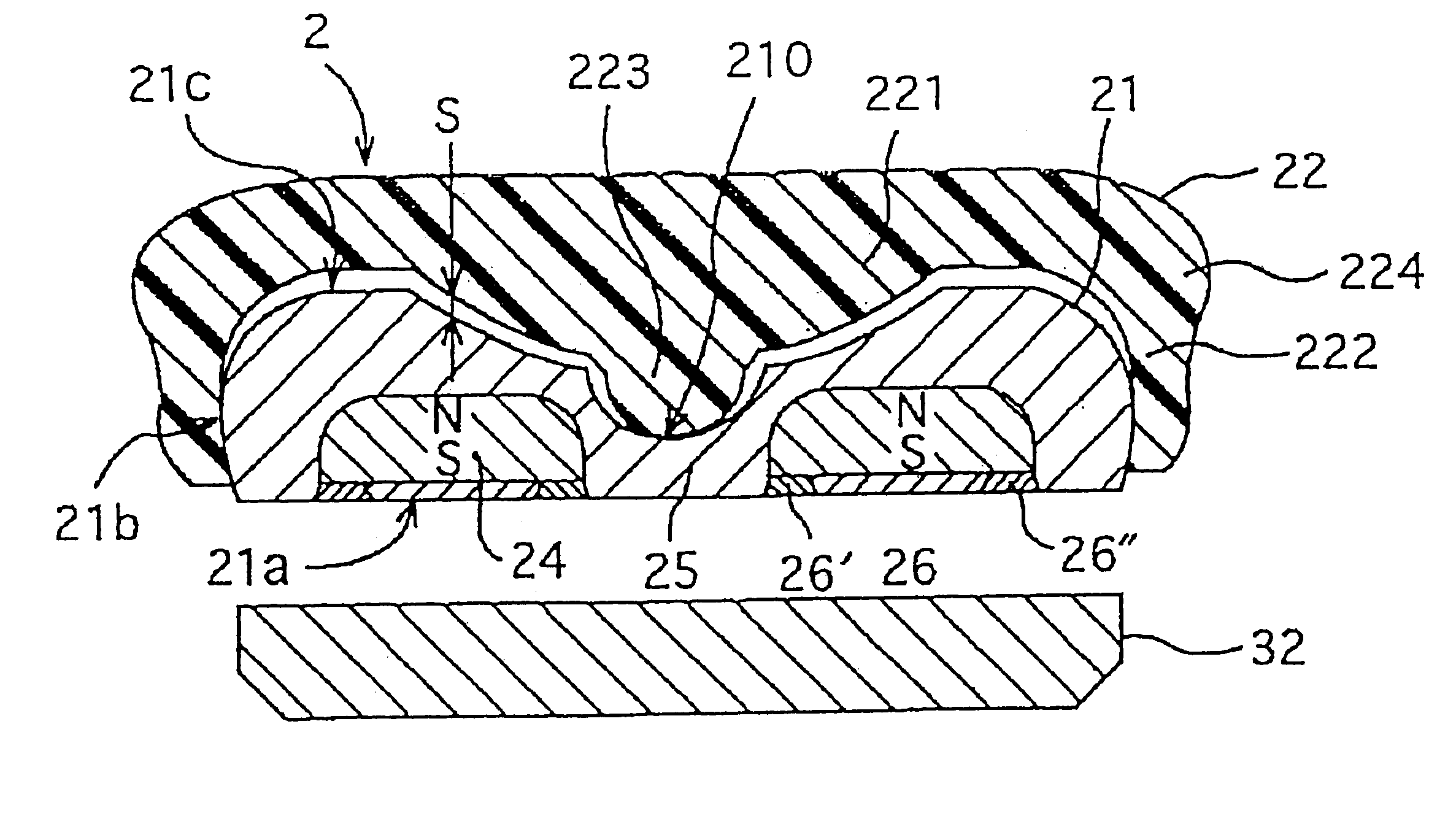 Dental magnetic attachment and its fixing method including spacer