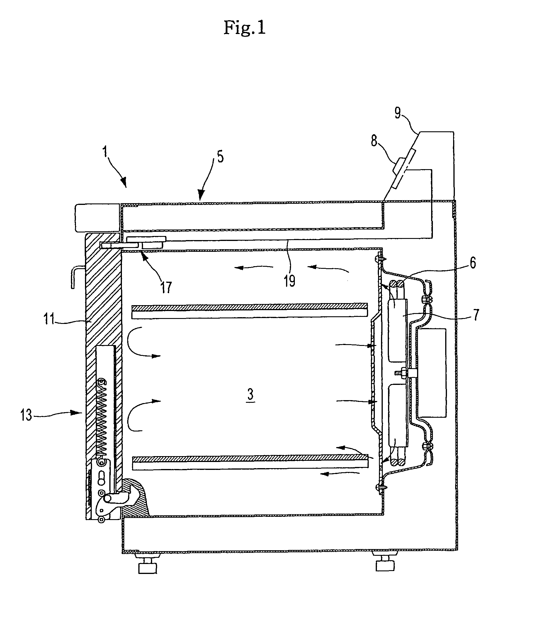 Heating cooker with hinged door