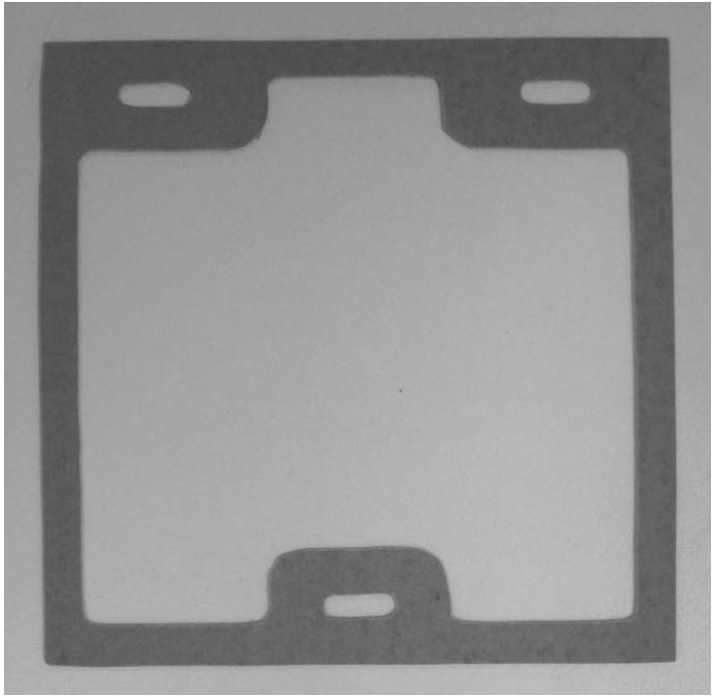 Sealing gasket for medium-and-low temperature solid oxide fuel cell, and manufacturing method and application of sealing gasket