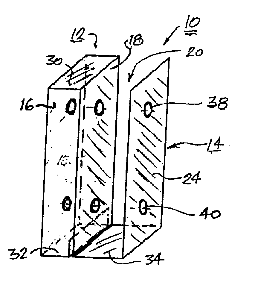 Spacer for mounting a deck ledger board to a building surface