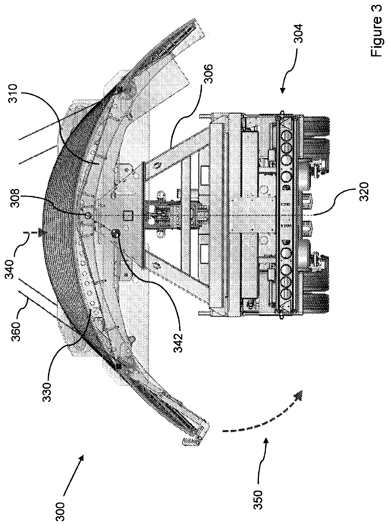 Transportation system and method for loading a wind turbine tower segment