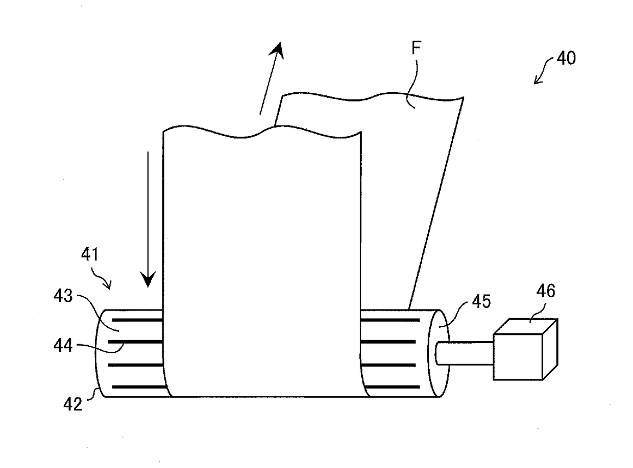 Expander device, porous film production apparatus, and porous film producing method