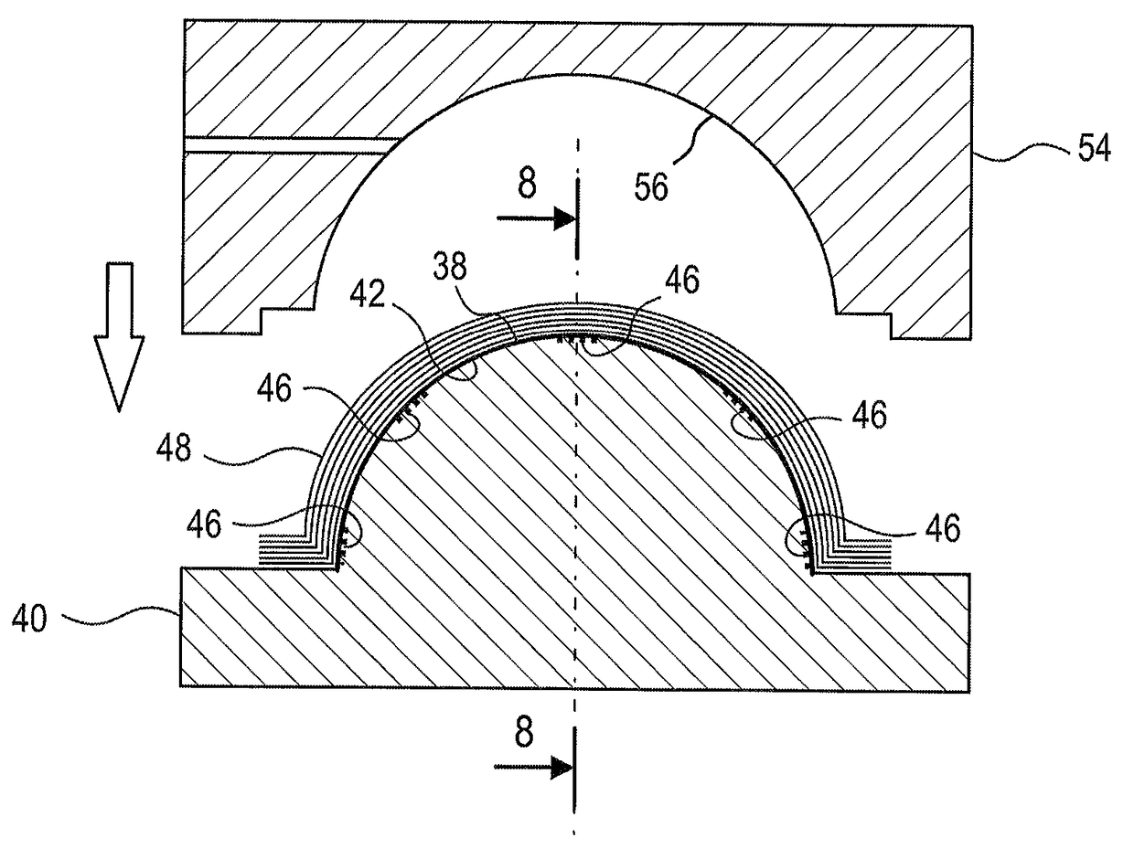 Provisional retention of metal sheet on a mold by microwelds