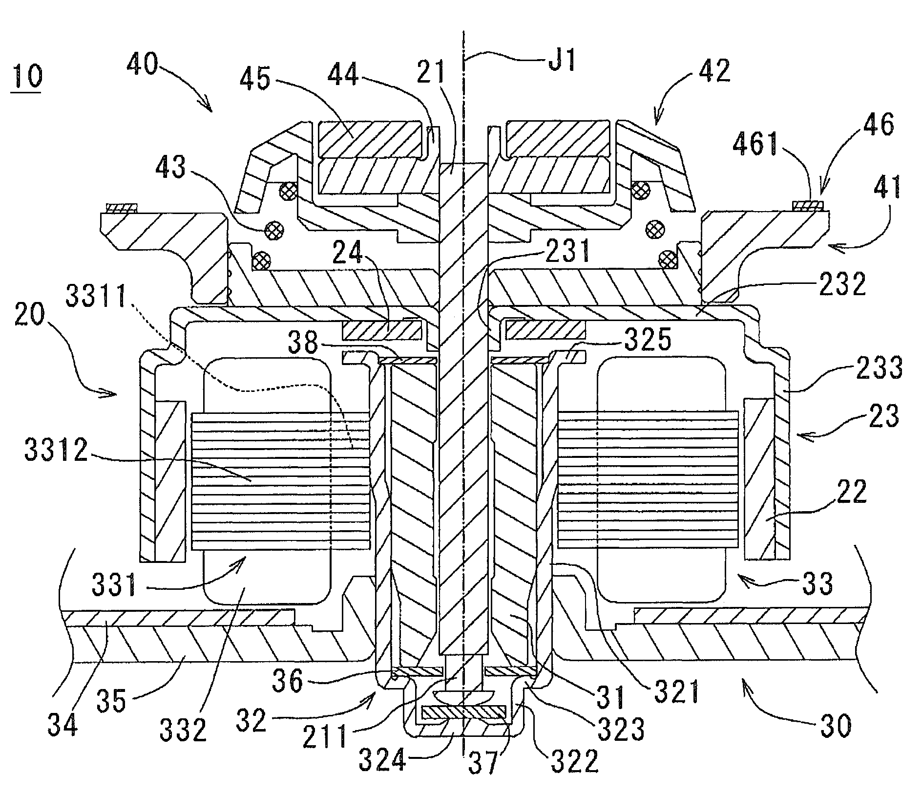 Motor having chucking device and disk driving apparatus including same