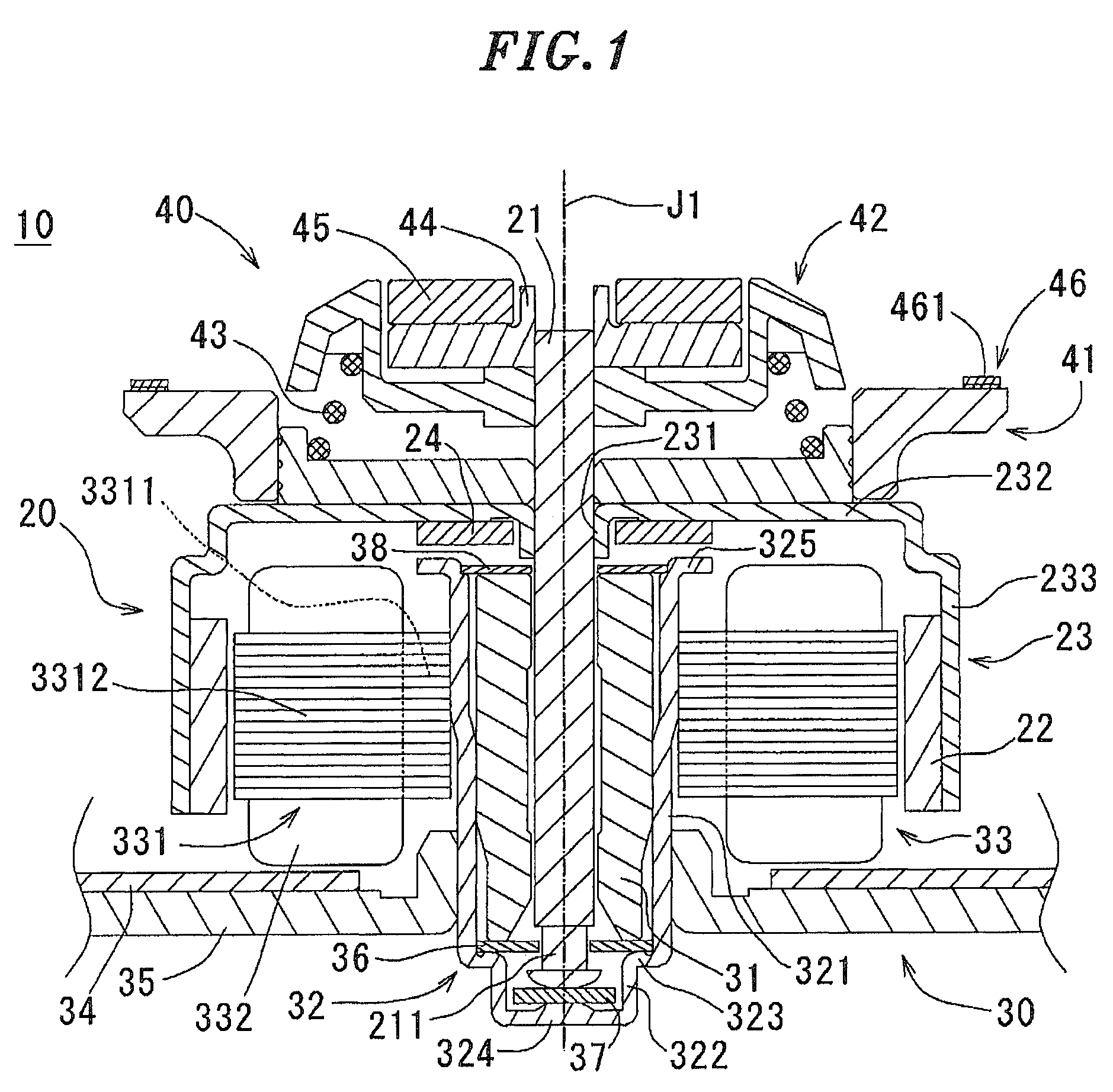 Motor having chucking device and disk driving apparatus including same