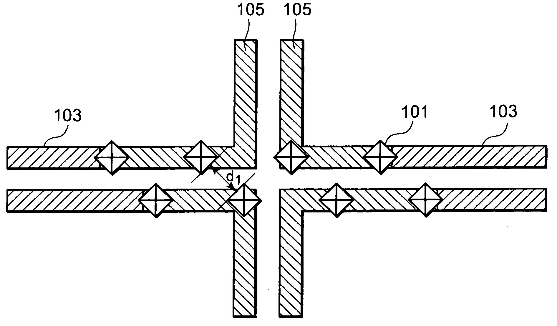 Reticle, and method of laying out wirings and vias