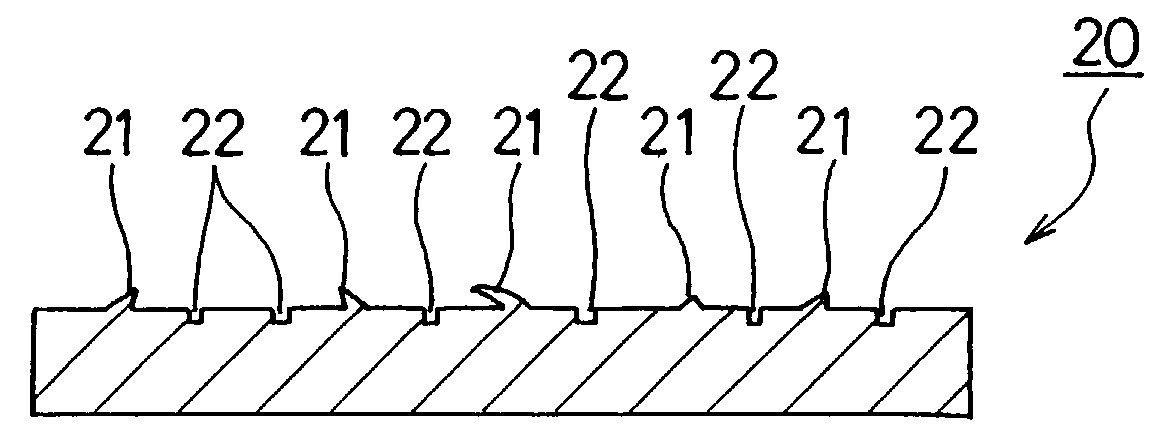 Surface treatment method of metal member, and metal goods