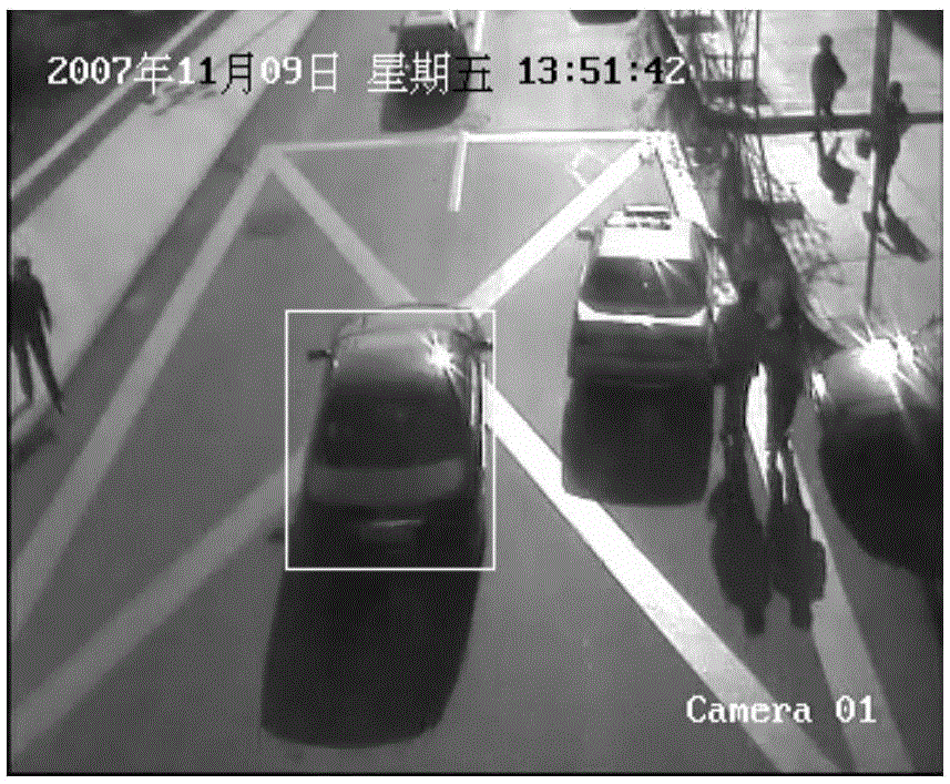 System and method of monitoring illegal traffic parking in yellow grid line area