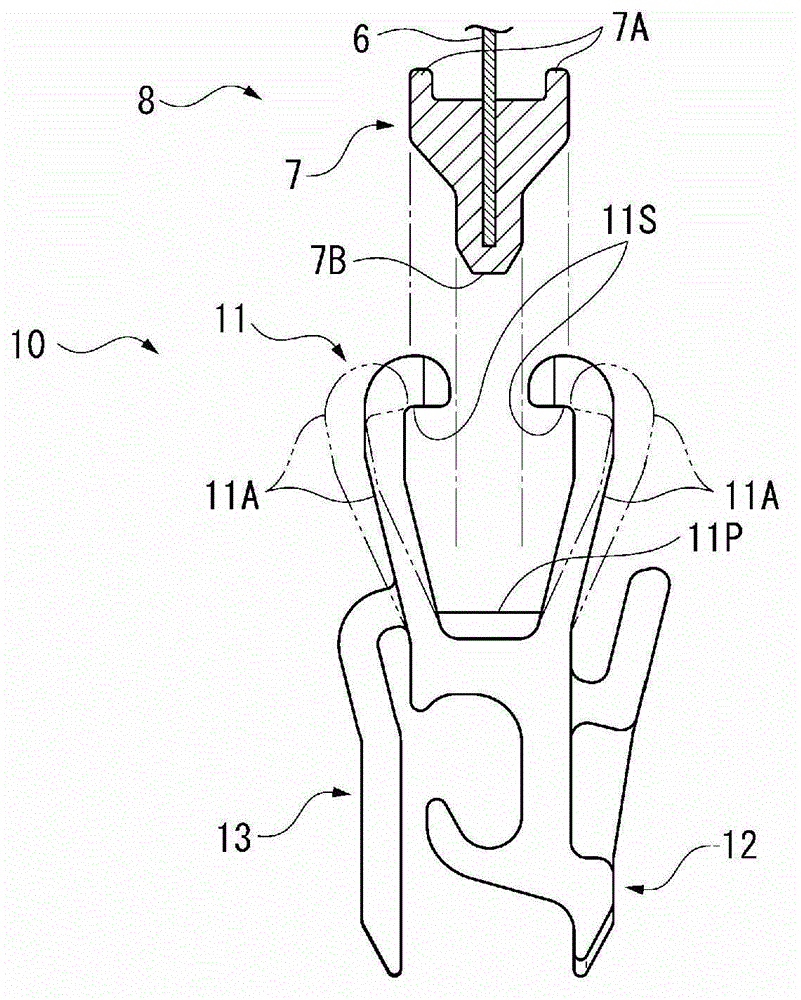 Clip for fastening surface skin material