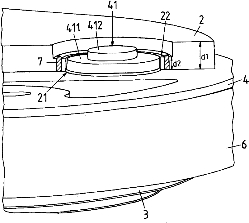 Apparatus comprising a fitting and an adapter plate and method for producing such an apparatus